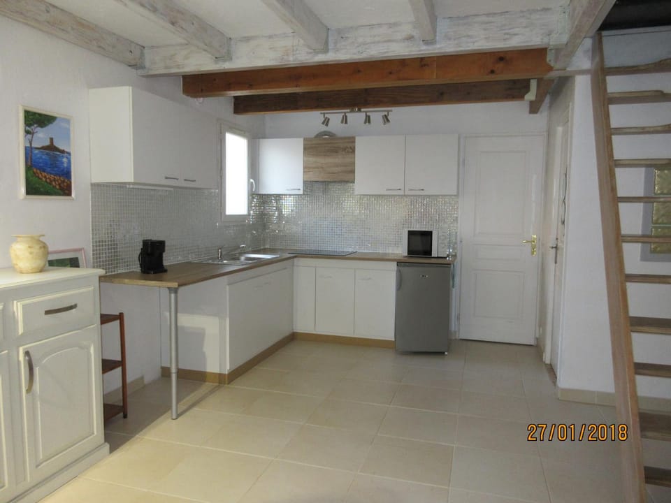 Kitchen or kitchenette, stove, toaster