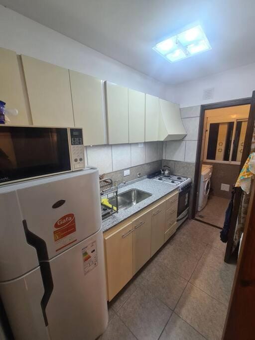 Kitchen or kitchenette, oven, stove