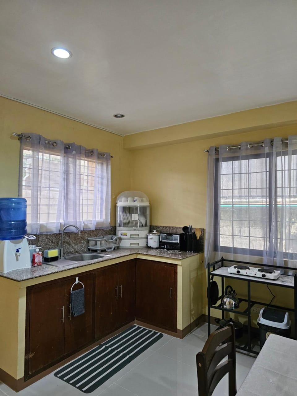 Kitchen or kitchenette, stove, toaster
