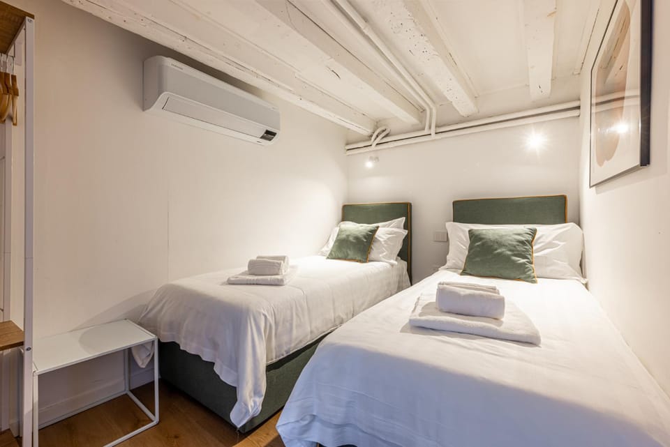 Bed, Photo of the whole room, Bedroom, towels, air conditioner