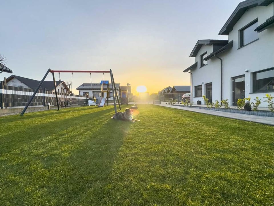 Property building, Children play ground, Garden, Garden view, Sunset