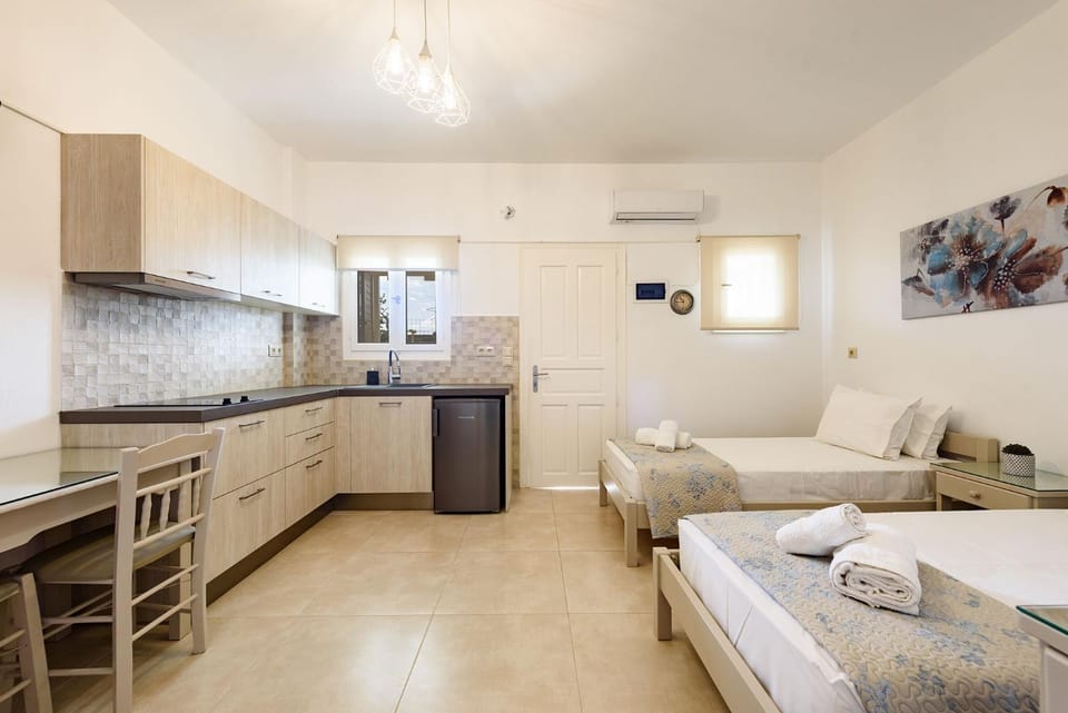 Bed, Kitchen or kitchenette, locker, locker, air conditioner