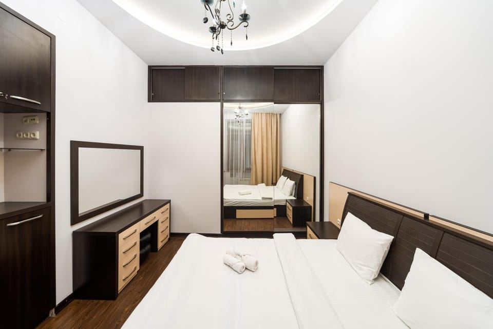 Bed, Photo of the whole room, Bedroom, hair dresser, towels, wardrobe