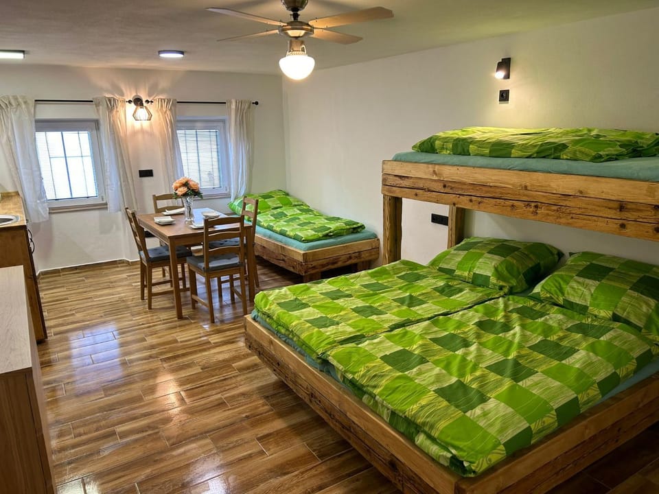 Bed, Living room, Seating area, Bedroom