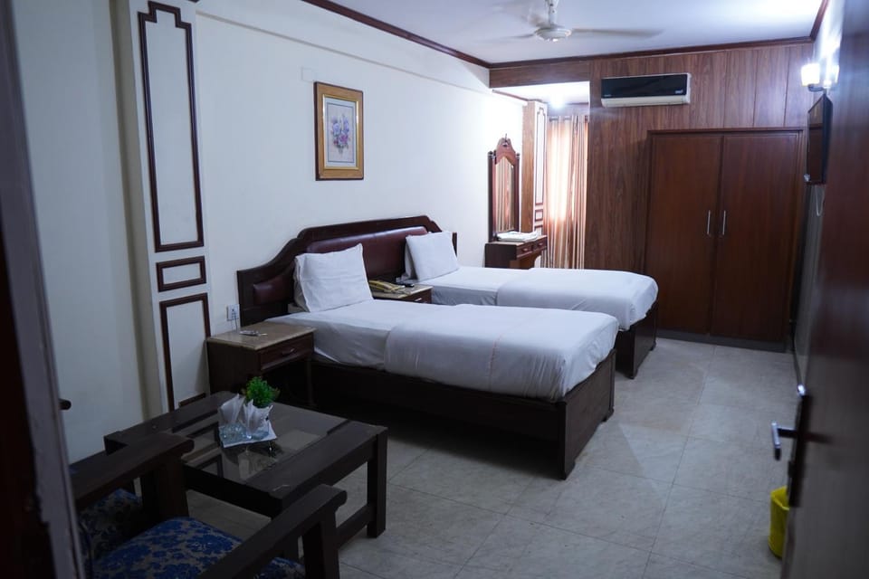 Bed, Bathroom, Seating area, wardrobe, air conditioner