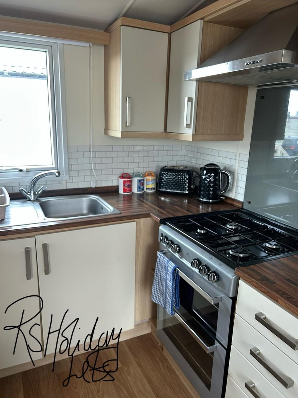 Kitchen or kitchenette, stove, toaster