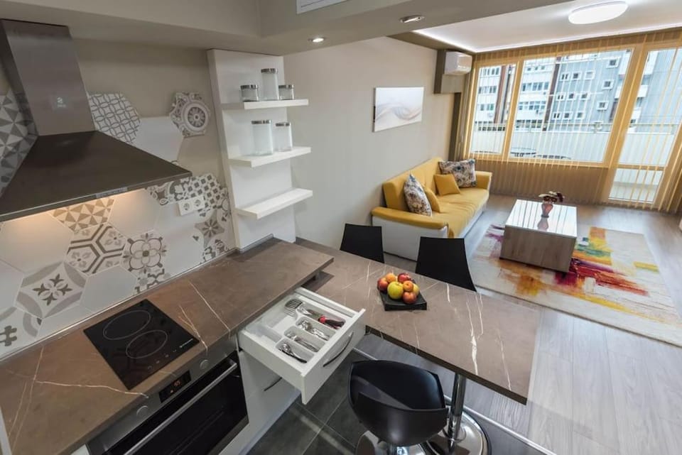 Kitchen or kitchenette, Living room, Seating area, oven, stove