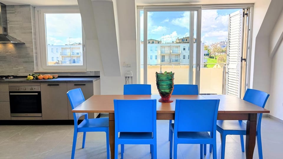 View (from property/room), Balcony/Terrace, Kitchen or kitchenette, Dining area, dishwasher, oven, stove, kitchen, air conditioner