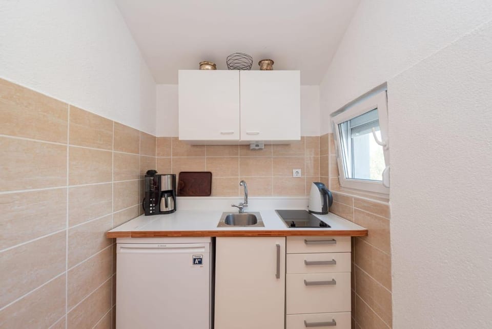 Coffee/tea facilities, Kitchen or kitchenette, minibar, stove, toaster