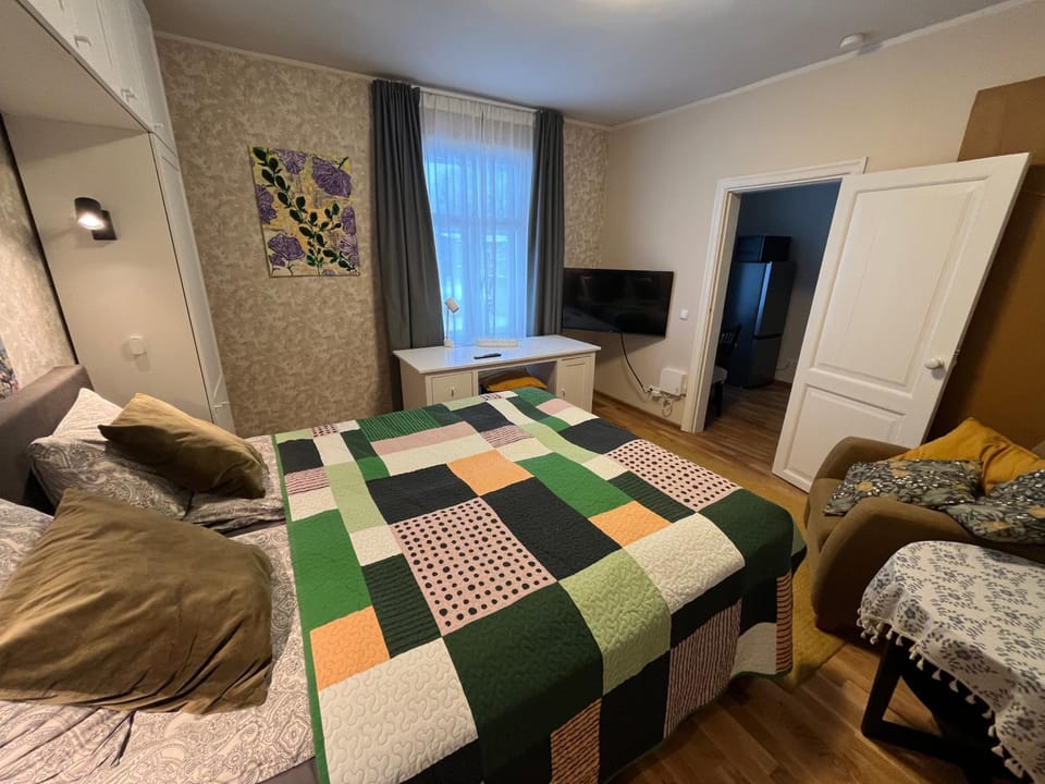 Bed, Living room, Seating area, Bedroom