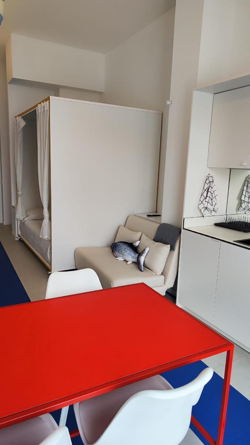 Kitchen or kitchenette, Living room, Seating area, Dining area