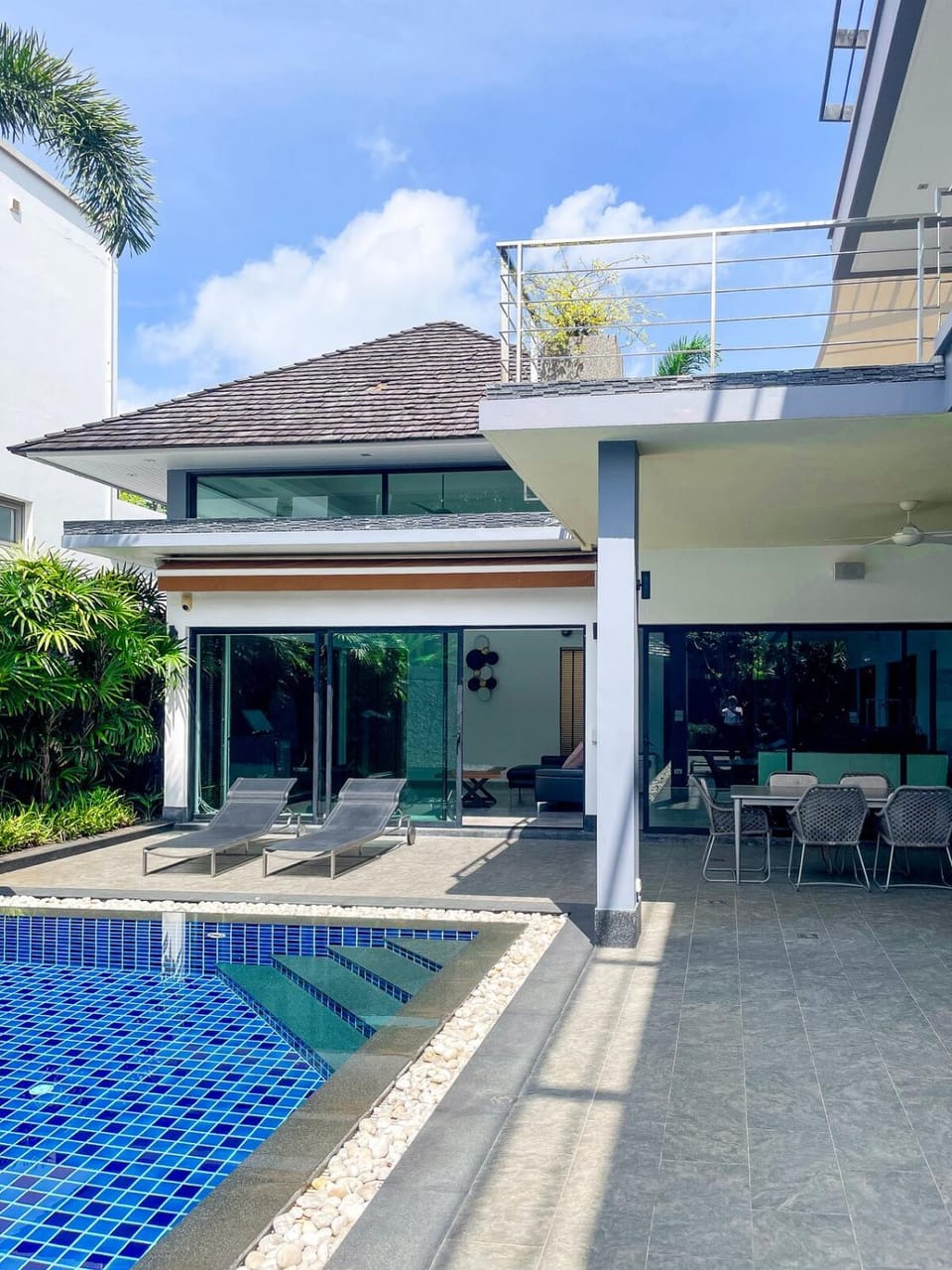 Property building, Patio, Pool view, Swimming pool, sunbed