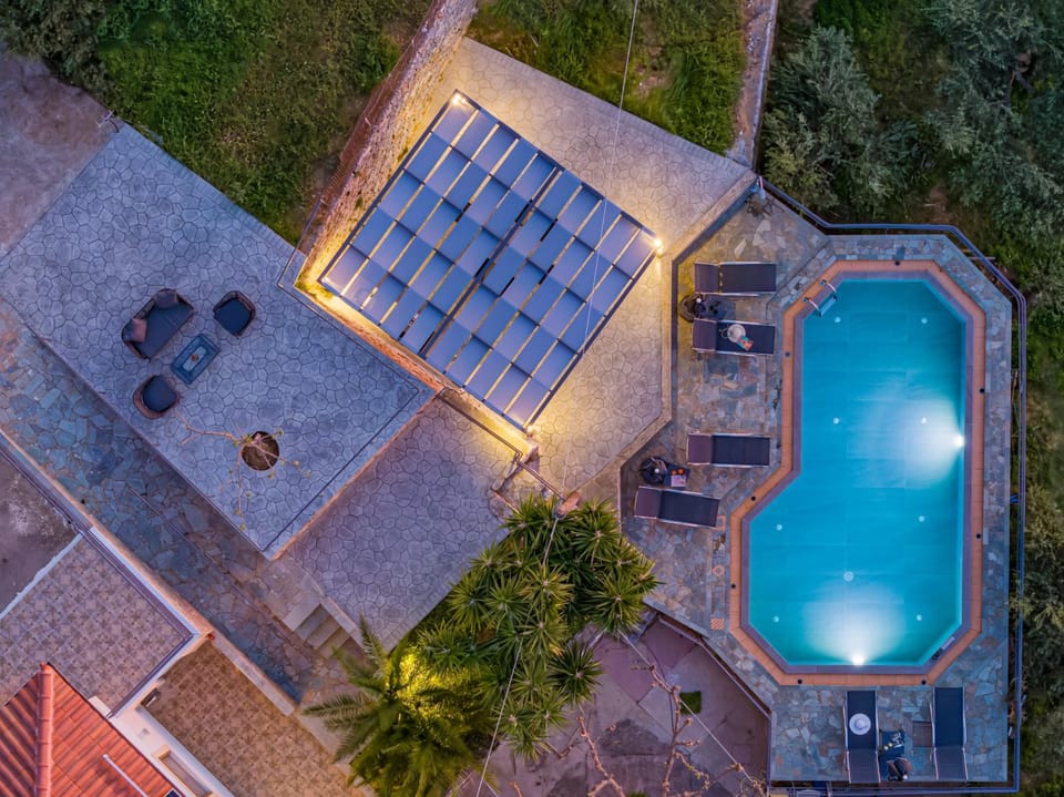 Property building, Patio, Day, Night, Pool view, Swimming pool, sunbed