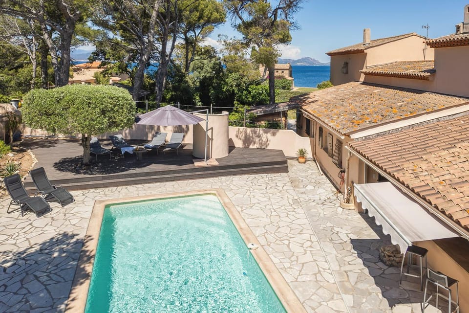 Property building, Patio, Day, Natural landscape, Pool view, Sea view, Swimming pool, Parking, sunbed