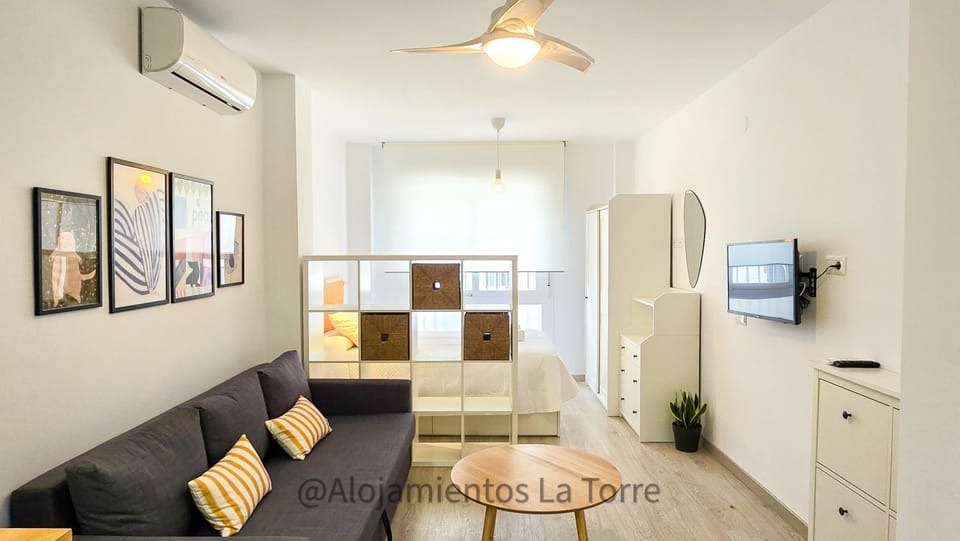 TV and multimedia, Living room, Seating area, fireplace, air conditioner