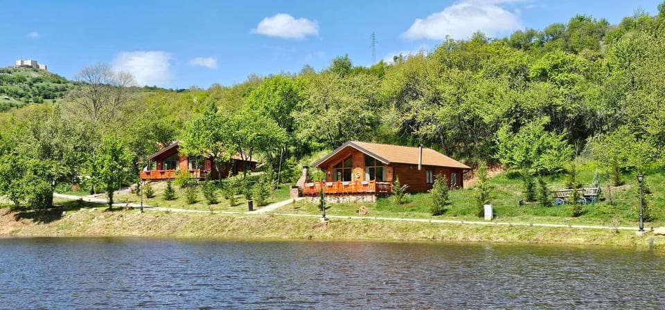 Property building, Nearby landmark, Spring, Day, Natural landscape, Lake view, Mountain view