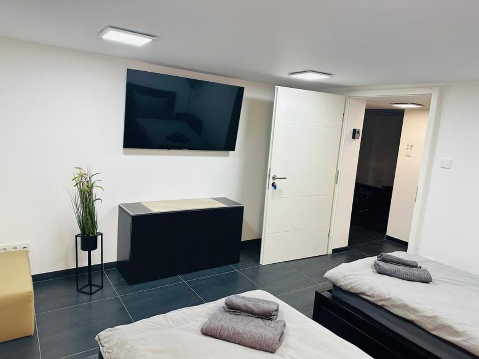 Bed, TV and multimedia, Bedroom, towels, wardrobe