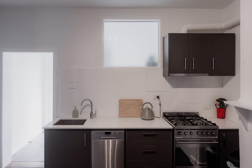 Kitchen or kitchenette, dishwasher, stove