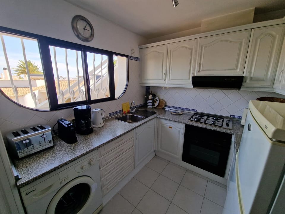 oven, stove, toaster, washing machine, kitchen