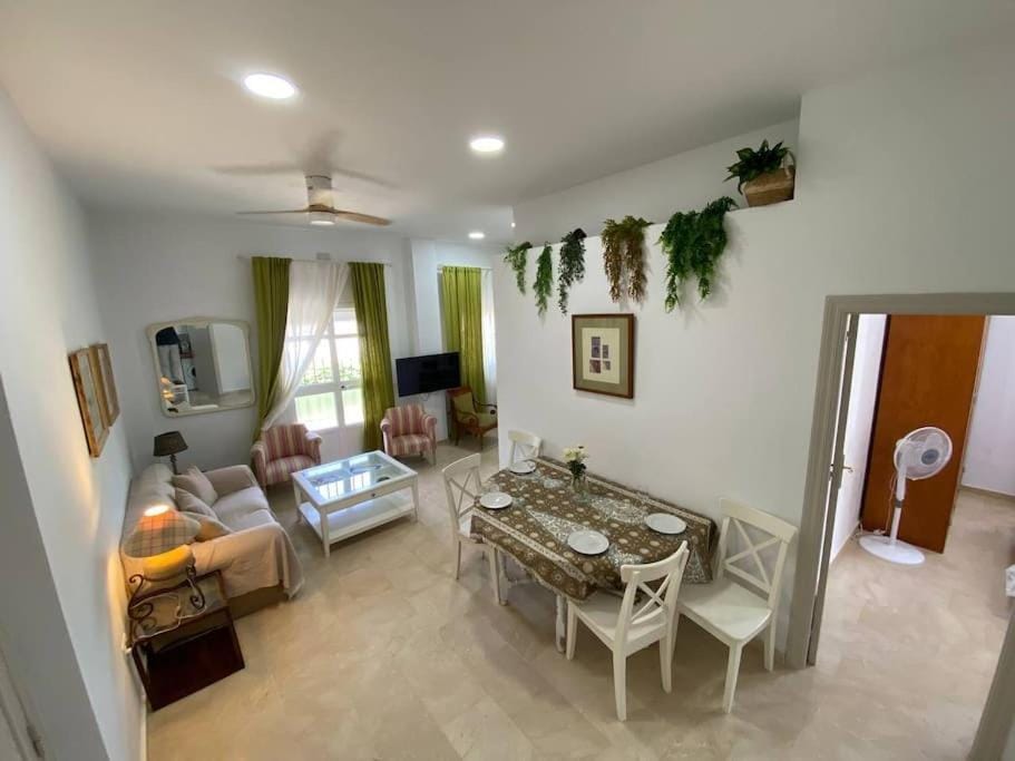 Living room, Dining area, fireplace, air conditioner