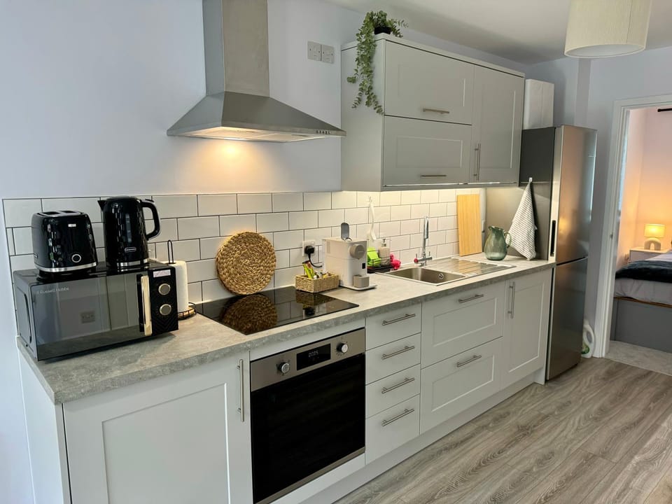Kitchen or kitchenette, oven, stove, toaster