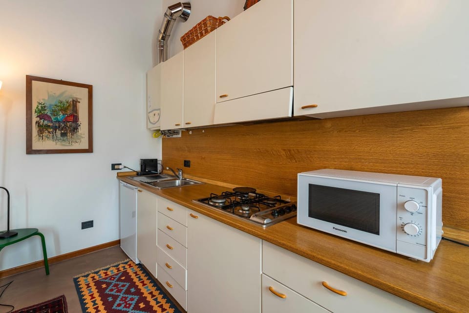Kitchen or kitchenette, stove