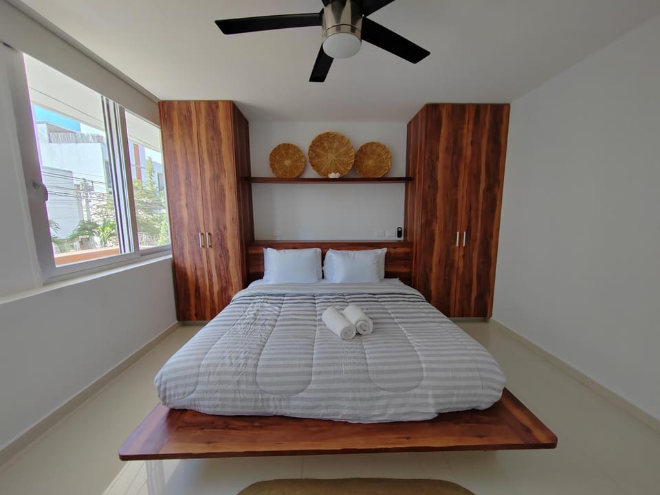 Bed, Bedroom, fireplace, towels