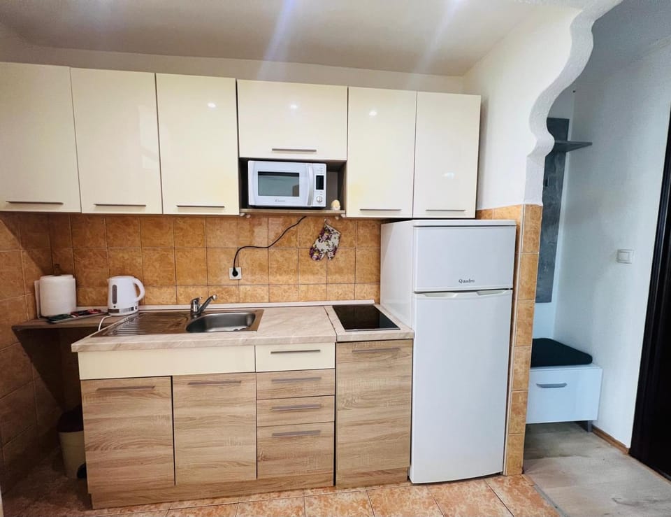 Kitchen or kitchenette, stove