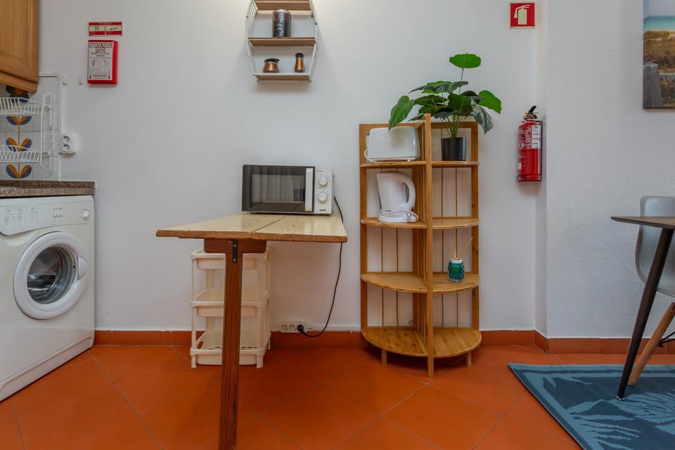 Kitchen or kitchenette, washing machine