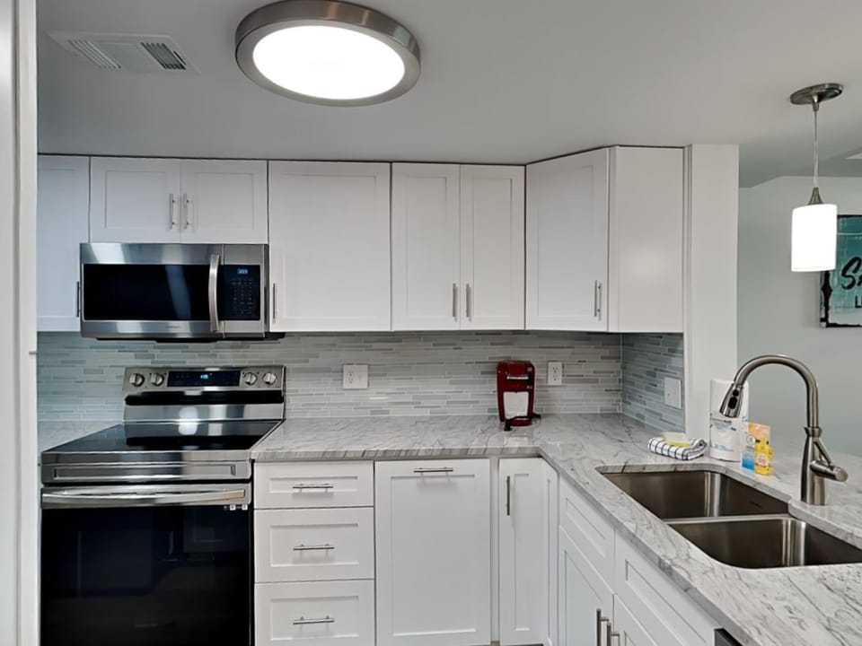 Kitchen or kitchenette, microwave, oven, stove, kitchen