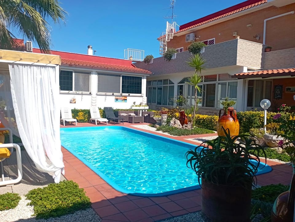 Property building, Garden, Pool view, sunbed