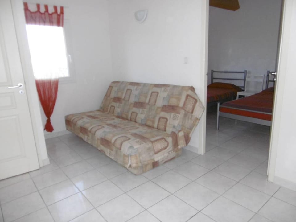 Bed, Living room, Seating area, Bedroom