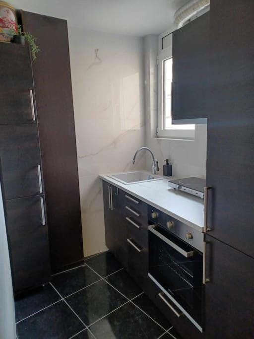 Kitchen or kitchenette, stove