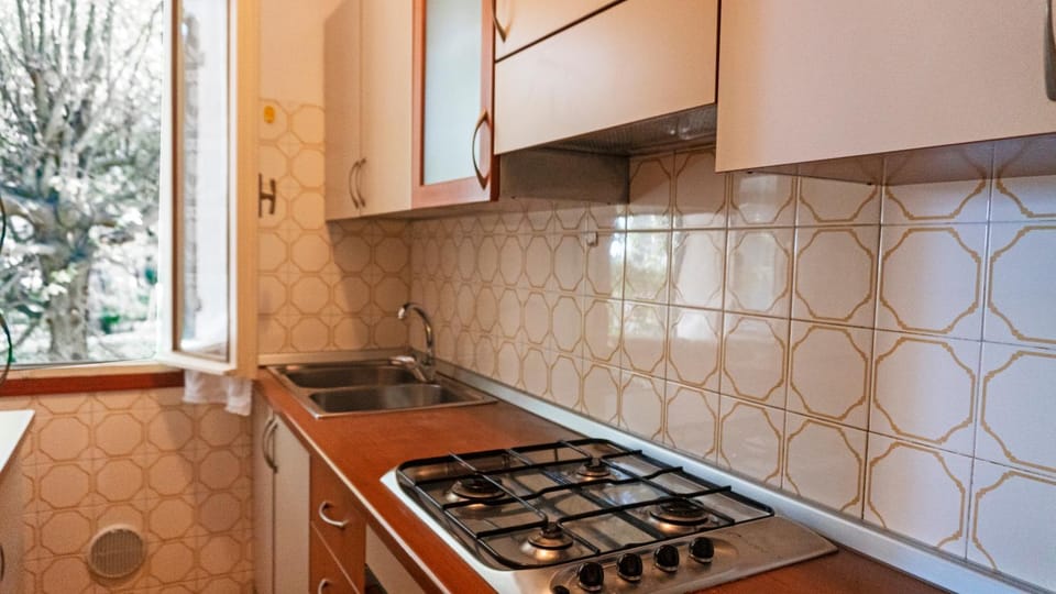 Kitchen or kitchenette, stove