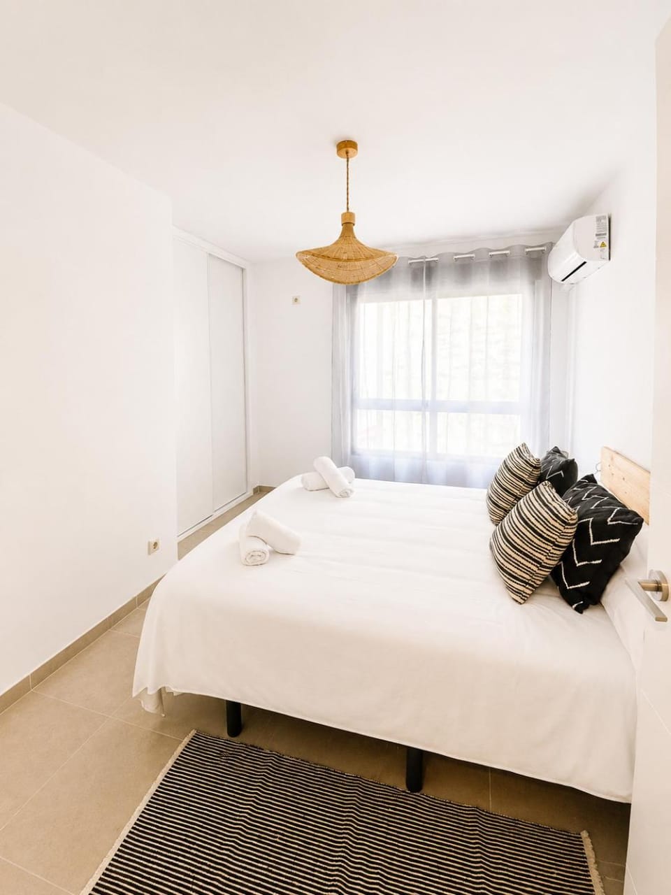 Bed, Photo of the whole room, Bedroom, towels, air conditioner