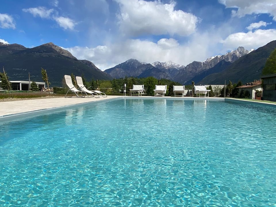 Day, Natural landscape, Mountain view, Swimming pool, sunbed