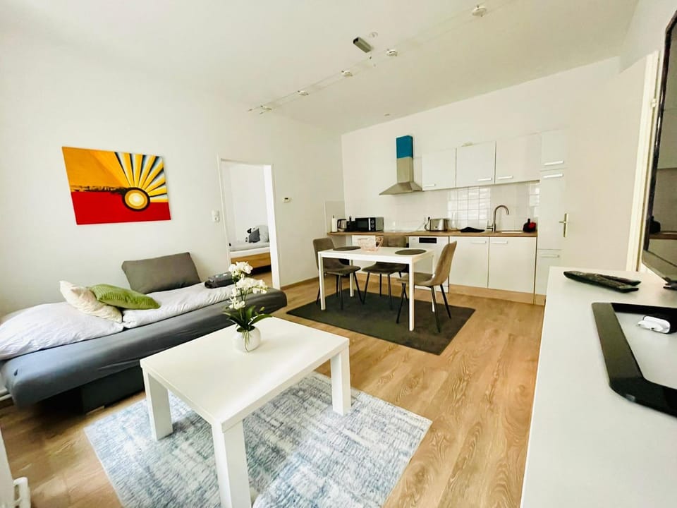 Kitchen or kitchenette, Living room, Seating area, Dining area
