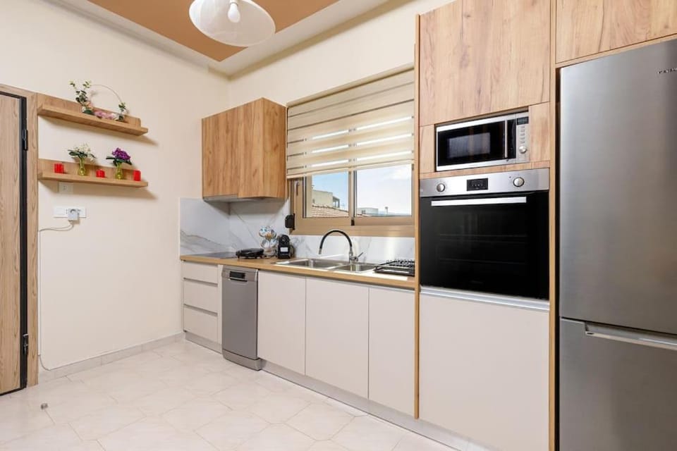 Kitchen or kitchenette, oven
