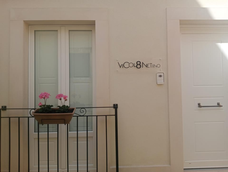 Property building, Property logo or sign, Text overlay, Internal: Not applicable to any particular room