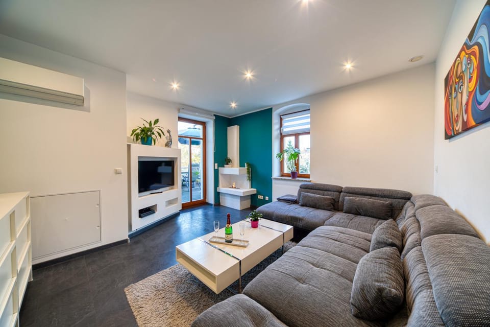 TV and multimedia, Living room, Seating area, fireplace, air conditioner