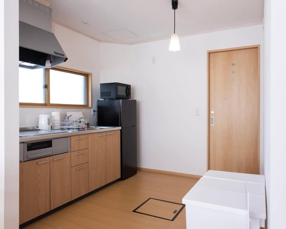Kitchen or kitchenette, microwave