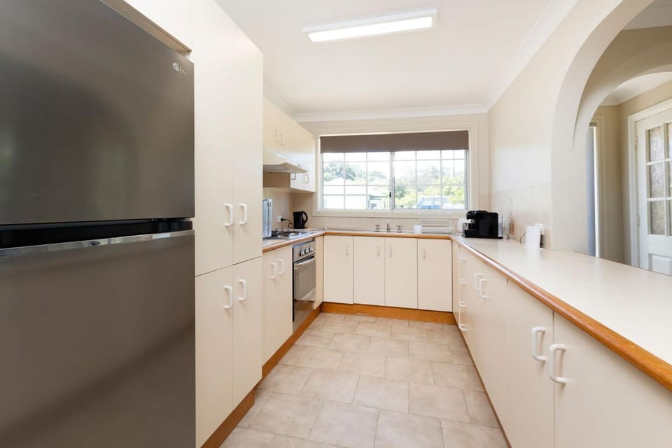 Kitchen or kitchenette, oven, stove