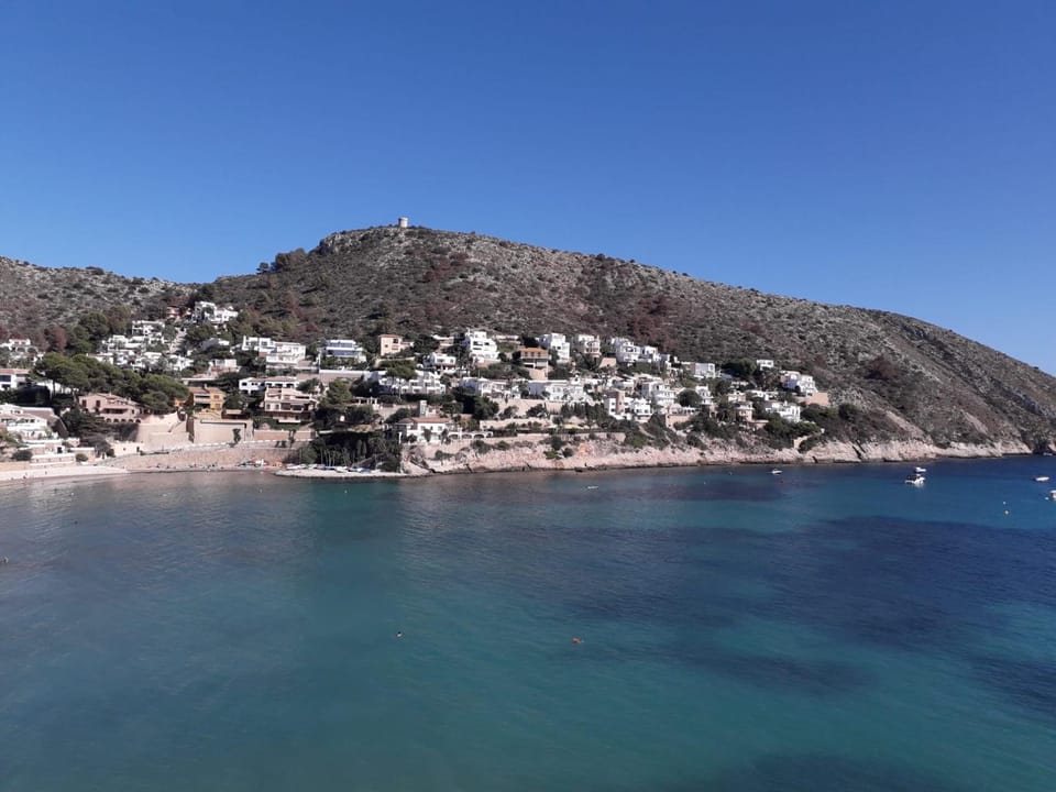 Apartamento en Moraira con piscina 100 m de la playa Apartment in Marina Alta