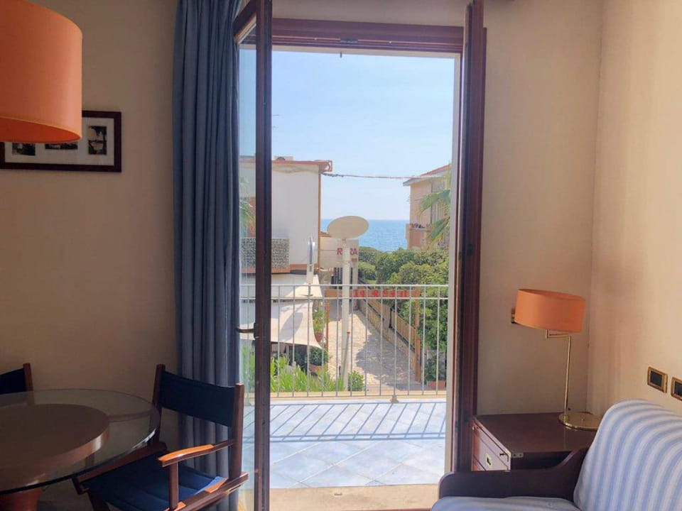 View (from property/room), Balcony/Terrace, Living room, Seating area, Sea view