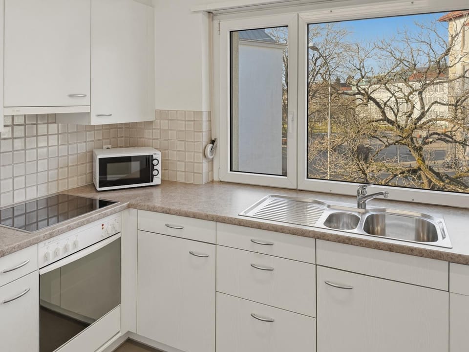 Kitchen or kitchenette, microwave, stove, kitchen
