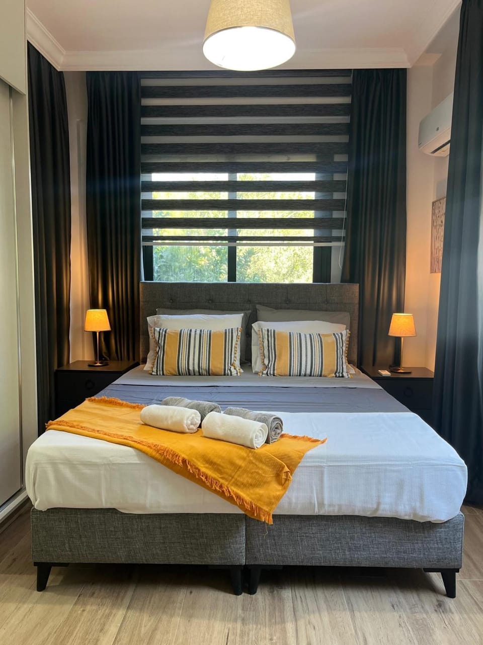 Bed, Bedroom, Garden view, flat iron, hair dryier, towels, air conditioner