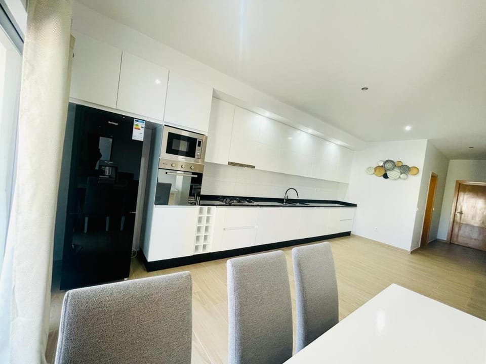 Kitchen or kitchenette, oven, stove