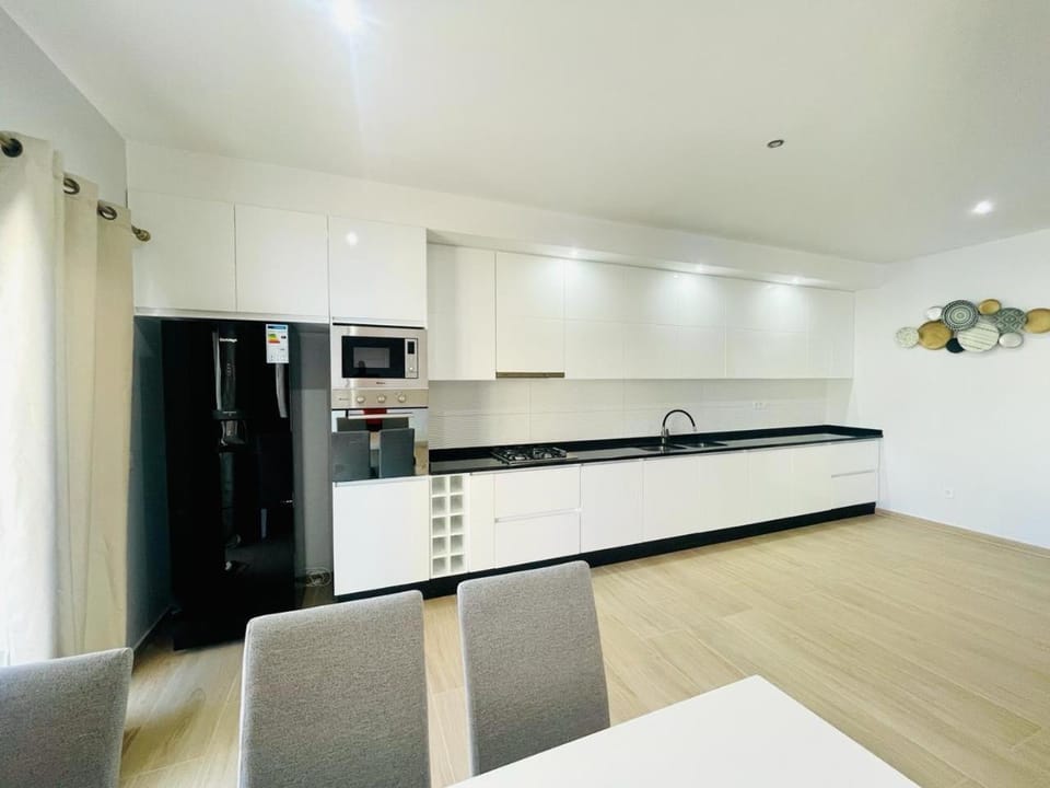 Kitchen or kitchenette, oven, stove
