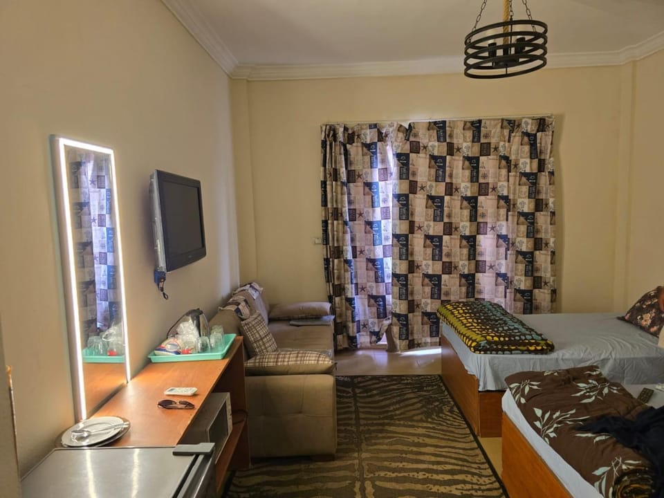 La sirena double room with mountain view, Families and couples only, Extra of 180 Egyptian pounds per adult person per stay ,to be paid to the resort Hotel in South Sinai Governorate