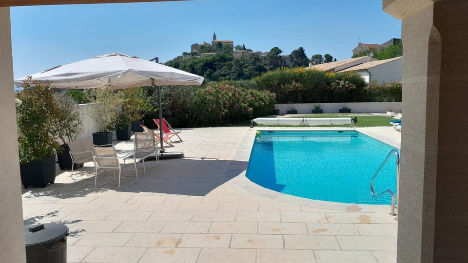 Property building, Living room, Swimming pool